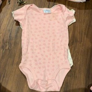Pink onesie with flowers